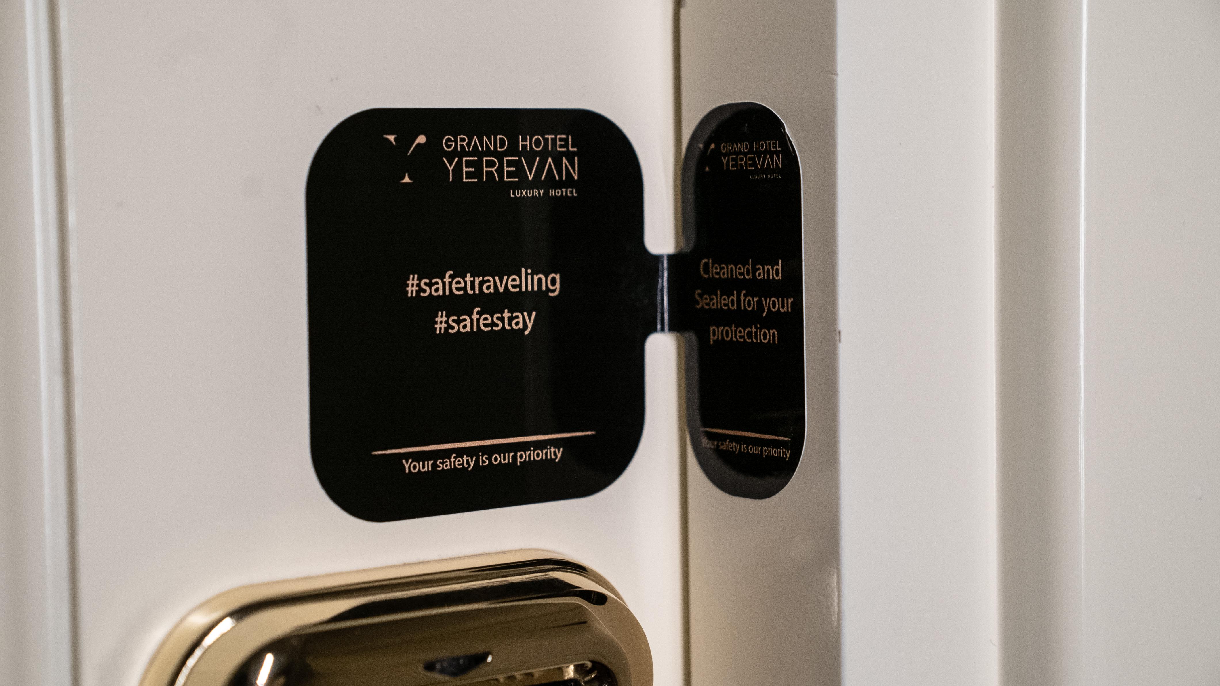 Grand Hotel Yerevan - Small Luxury Hotels Of The World Екстер'єр фото A door sign at Grand Hotel Yerevan